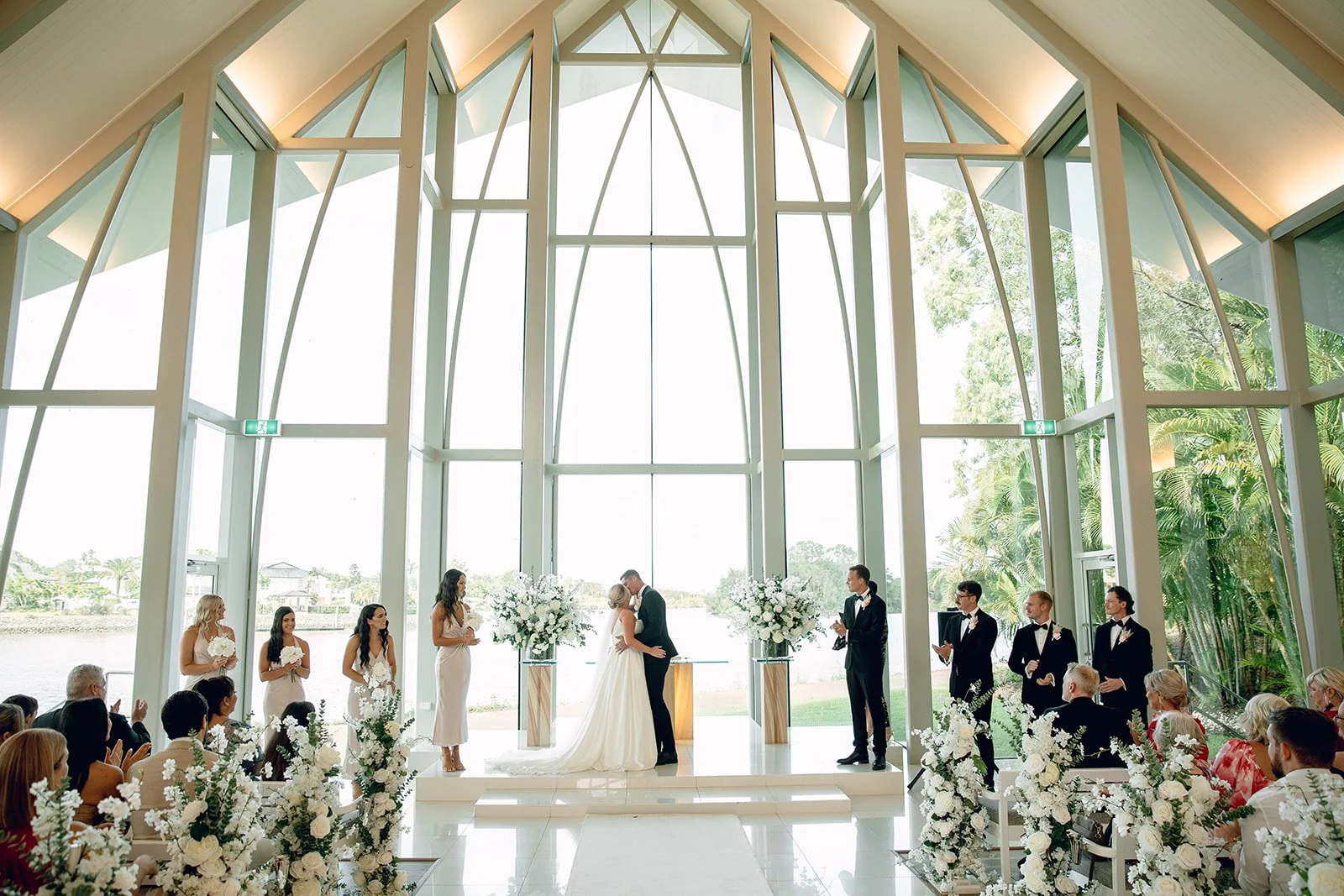 Couple kissing at altar